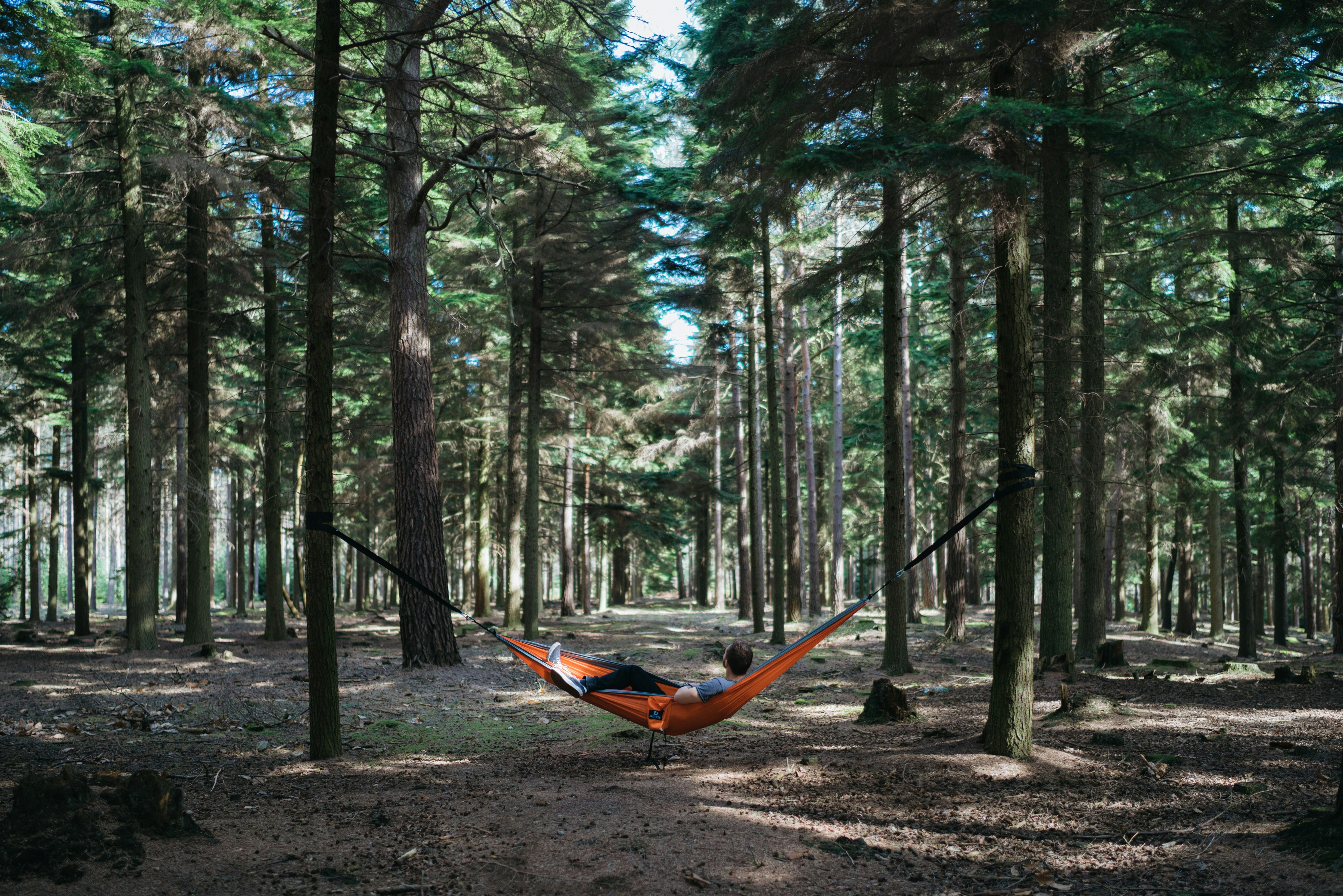 person on hammock outdoors
